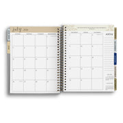 Open planner showing July and August 2023 with a monthly layout.
