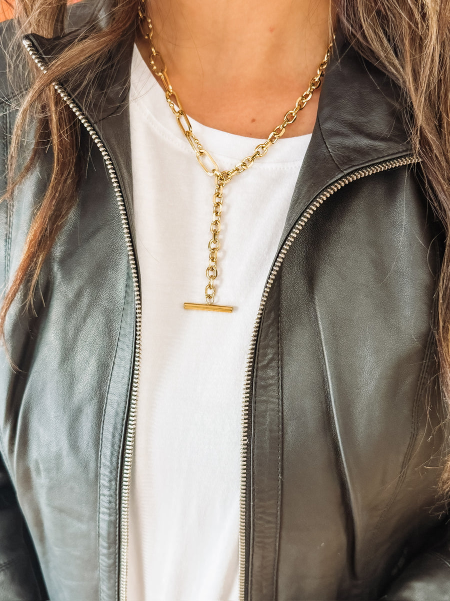 17 - 20 in necklace where two different gold chains converge to a drop down bar.