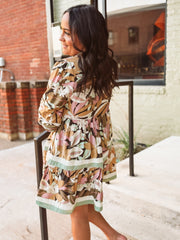 3/4's sleeve elastic cuff tiered mini dress with light floral detailing and contrast tiers.