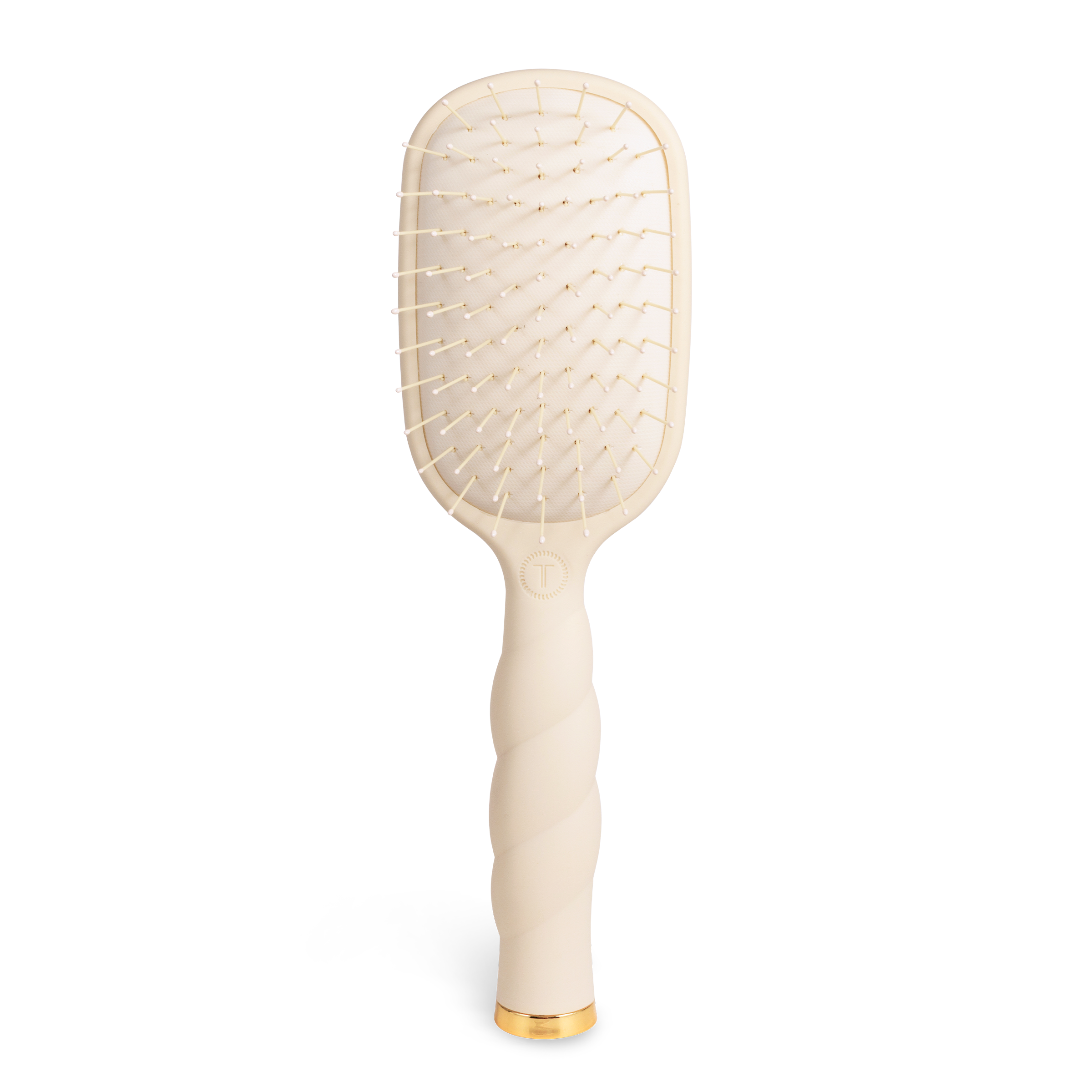 Beige paddle hairbrush with gold accents 