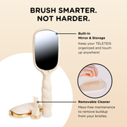 Beige paddle hairbrush with gold accents 