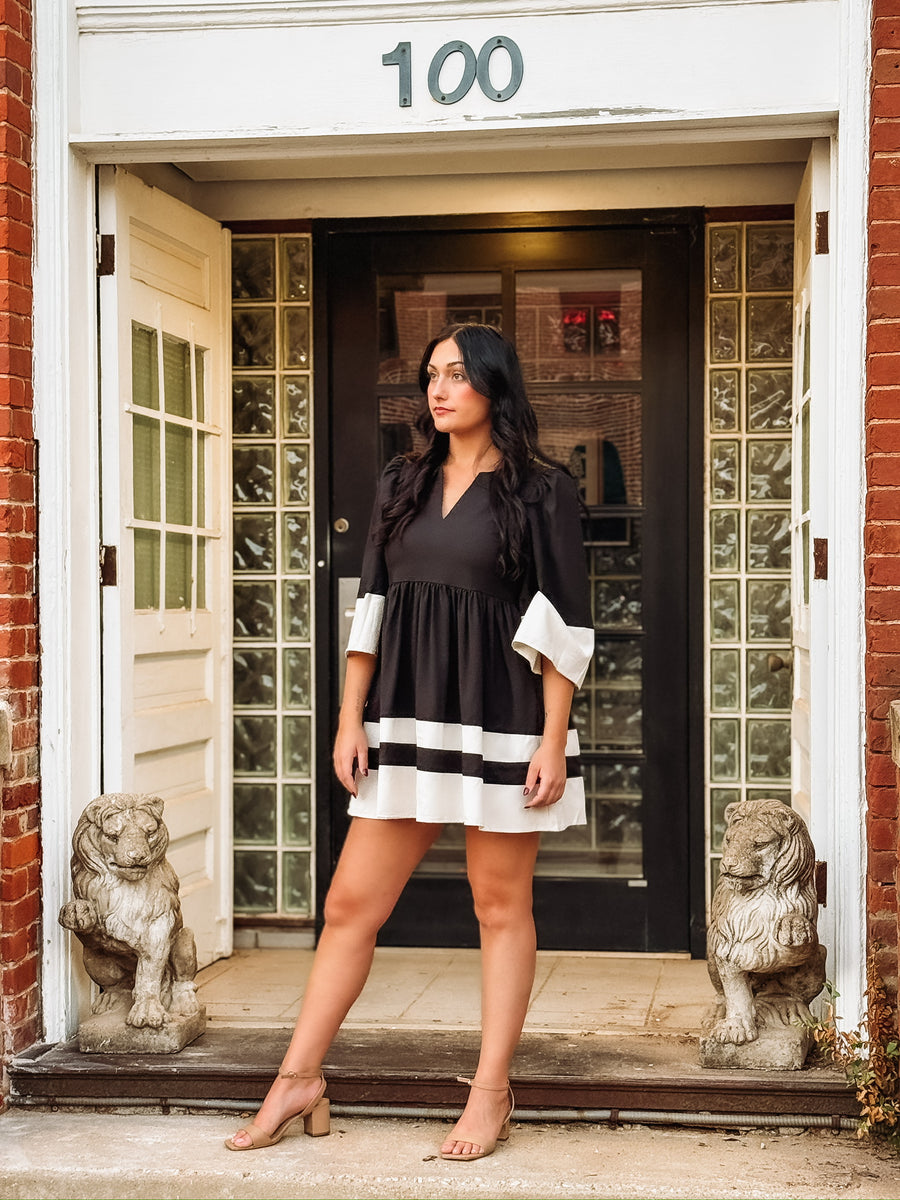  Black and white contrast striped kimono sleeve mini dress.