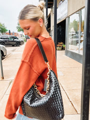 Black woven shoulder purse 