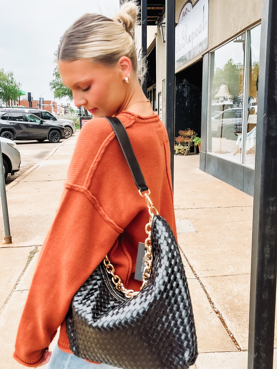 Black woven shoulder purse 