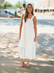 Blue and pink dainty floral maxi dress with adjustable spaghetti straps and a full button up front. 