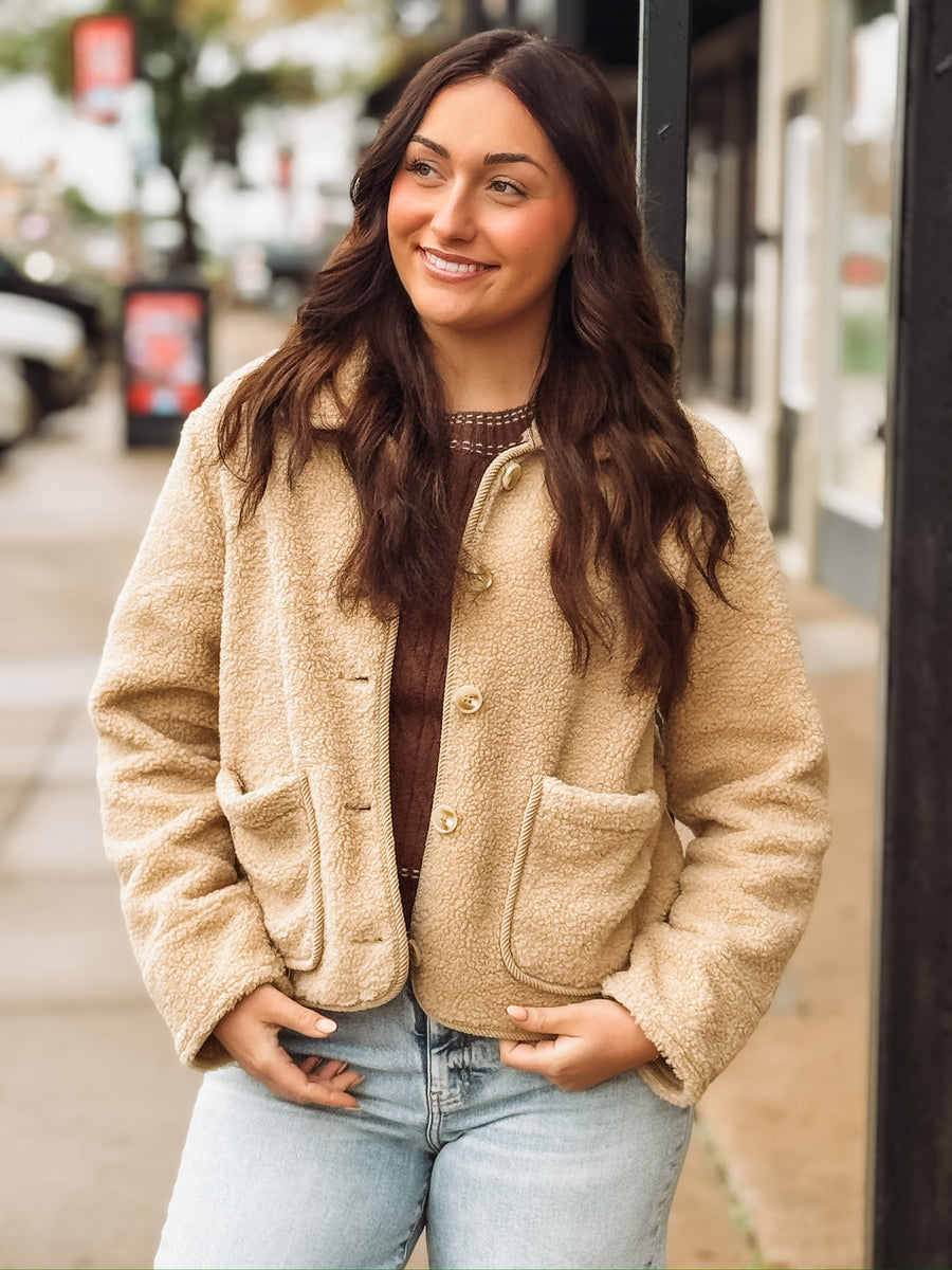 Bonded trim cropped button up sherpa jacket in a camel color.