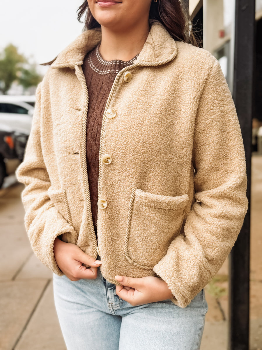 Bonded trim cropped button up sherpa jacket in a camel color.