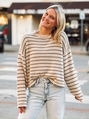 Brown and cream striped long sleeve sweater.