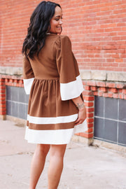  Brown and white contrast striped kimono sleeve mini dress.