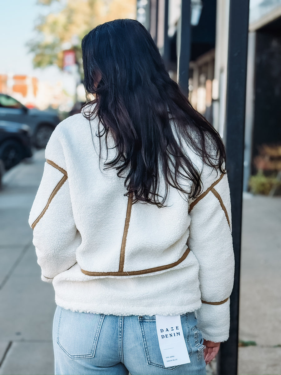 Brown suede contrast seamed sherpa jacket with zipper.