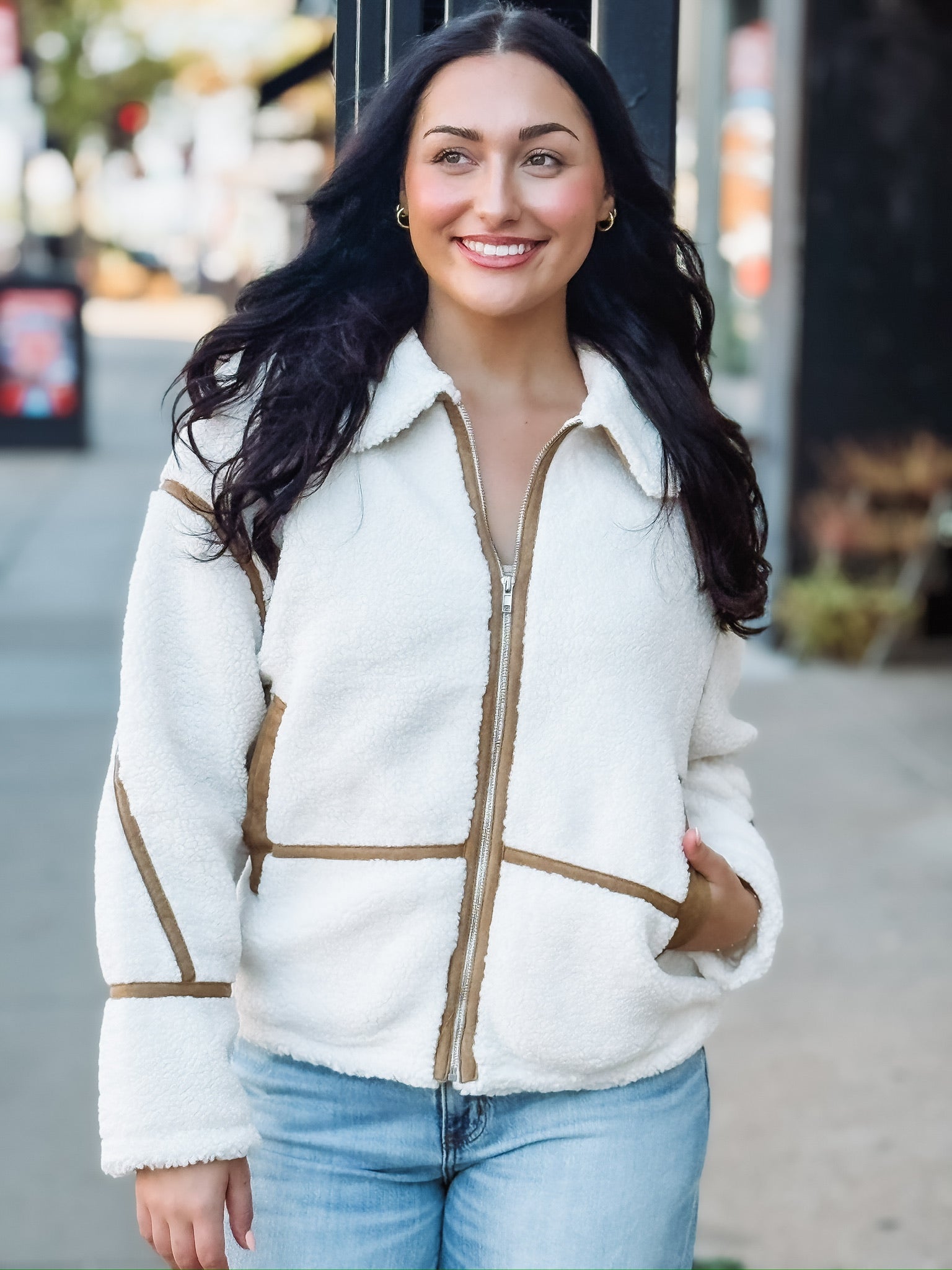 Brown suede contrast seamed sherpa jacket with zipper.