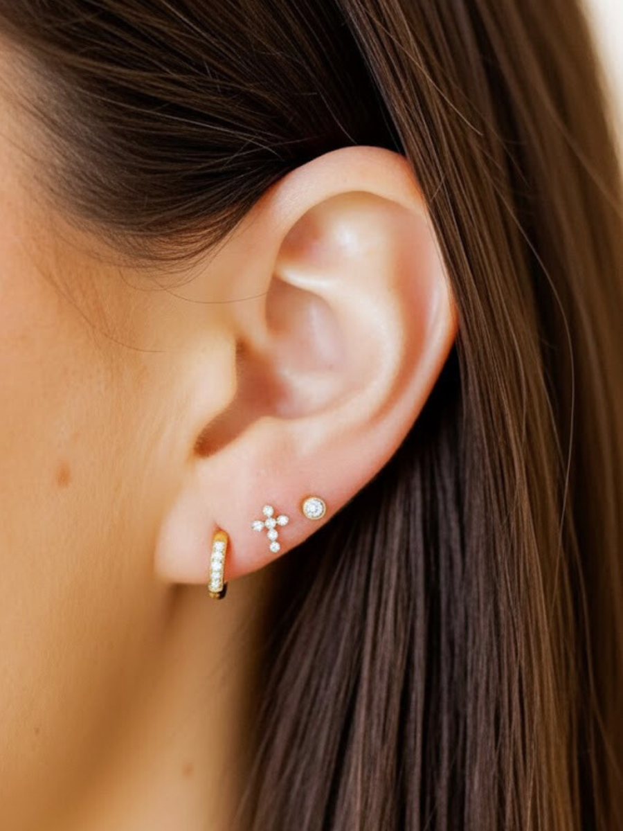 CZ flat black cross studs.