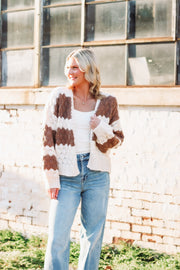 Brown and Cream knitted open front cardigan.