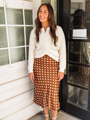 Cream knitted crewneck zip up jacket with front pockets.