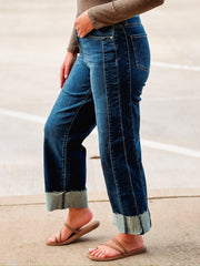 Dark wash cropped jeans with cuff and side seaming details 