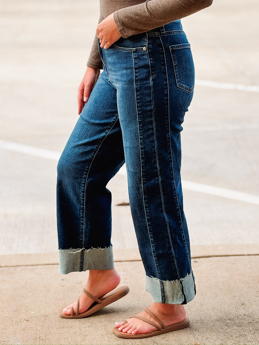 Dark wash cropped jeans with cuff and side seaming details 