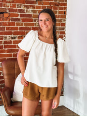 Brown suede like dress shorts.