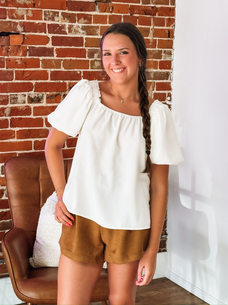 Brown suede like dress shorts.