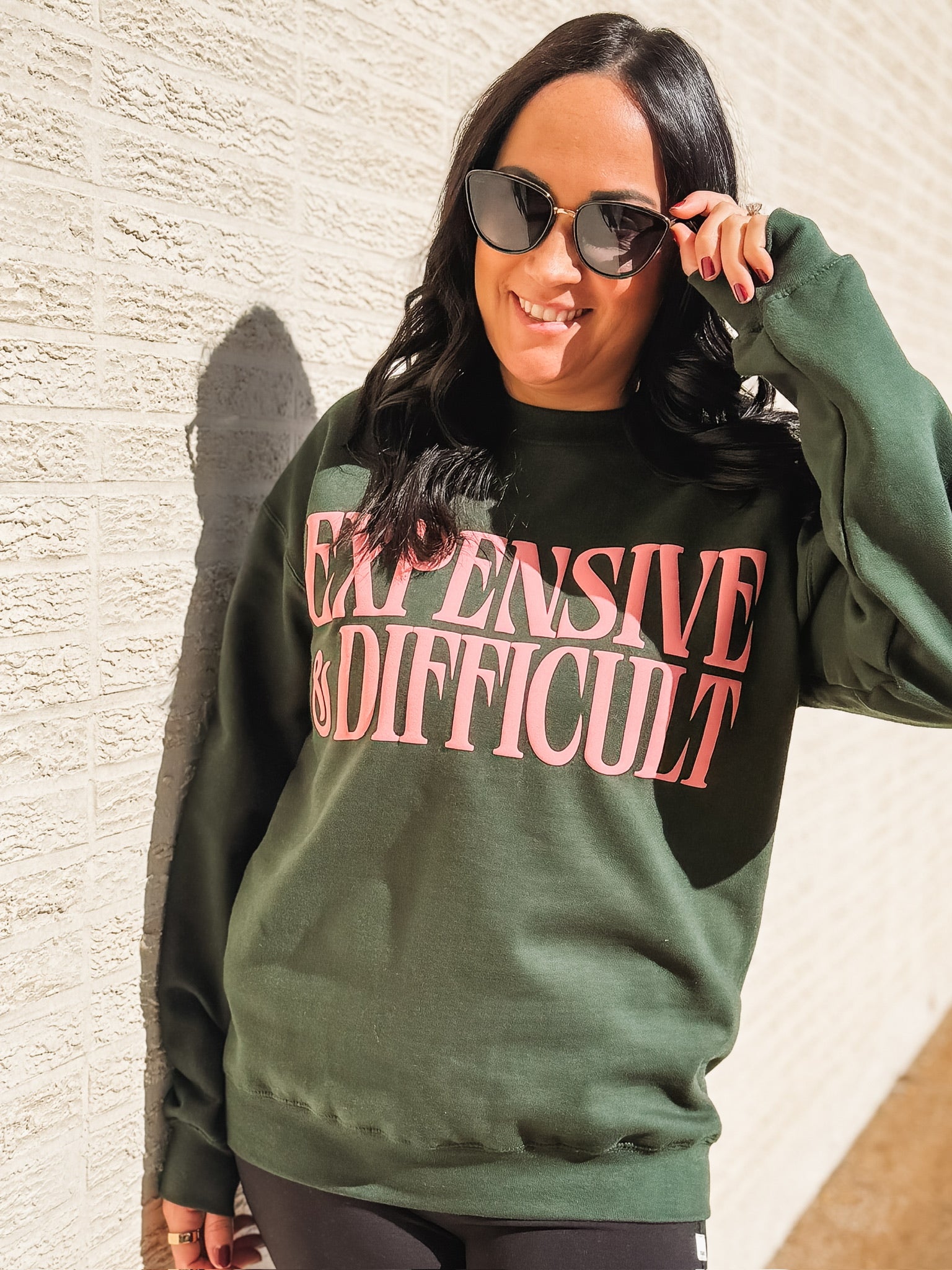 Expensive and Difficult printed on a green gildan crewneck.