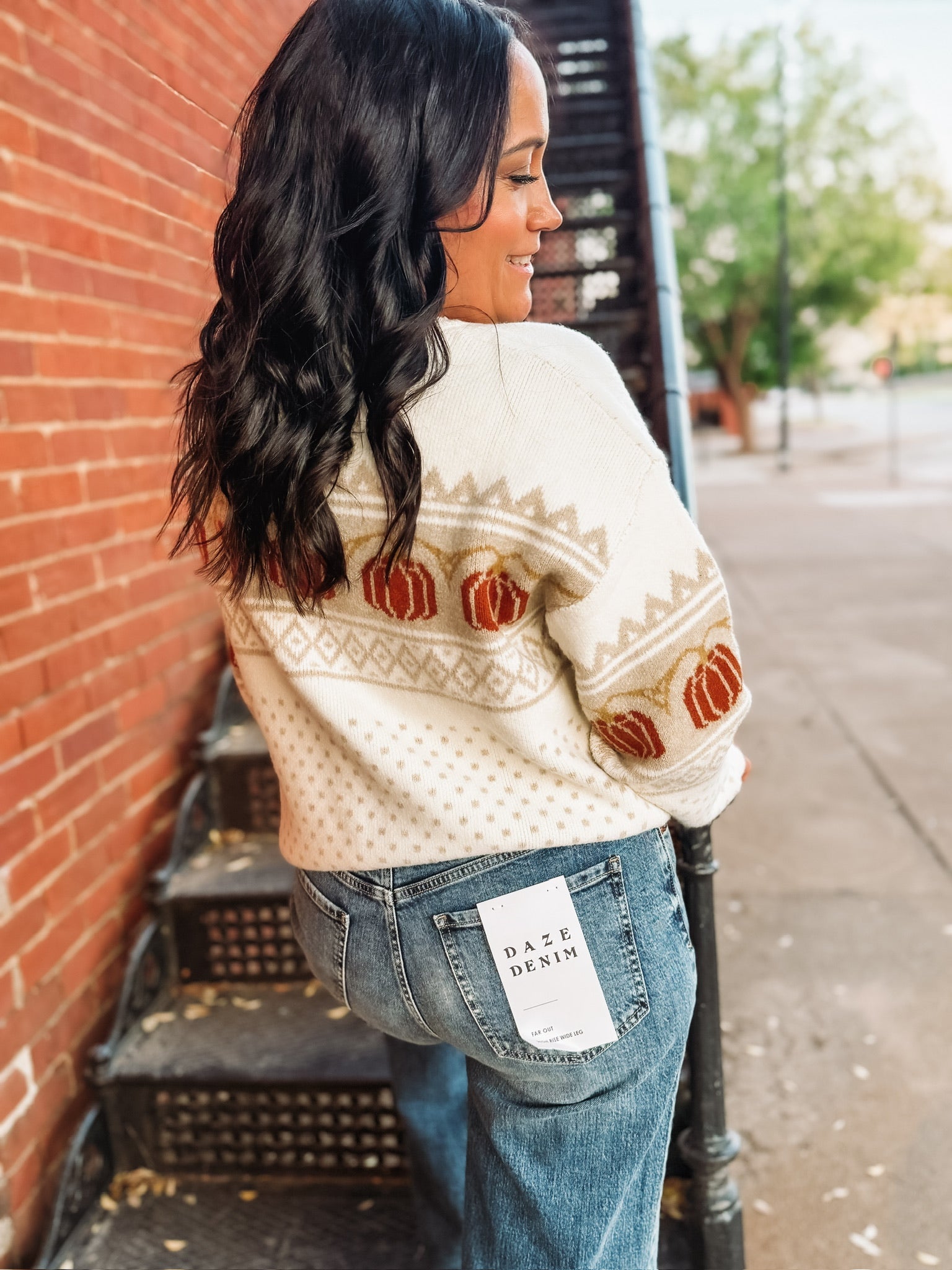 Long sleeve fairisle pumpkin detail sweater on an ivory base and cream and orange detail. 