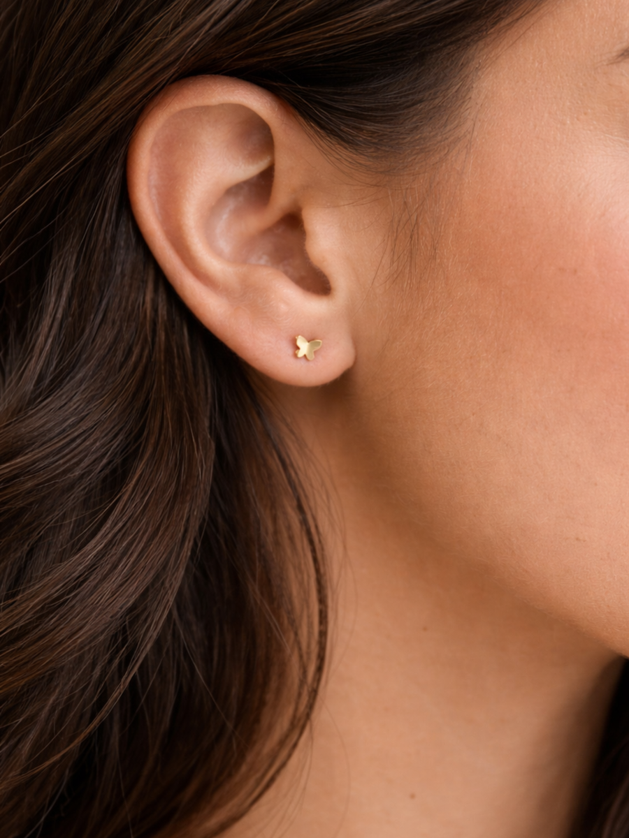 Flat back gold butterfly studs.