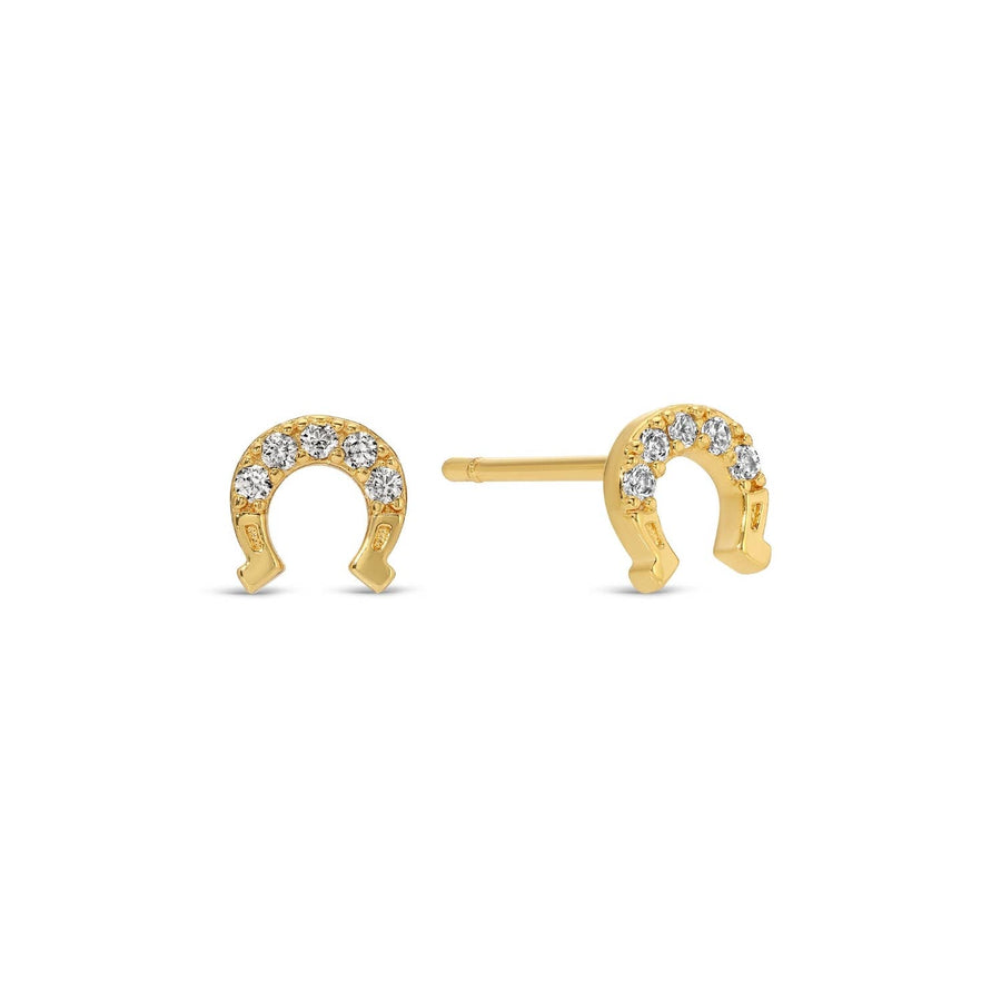 Gold pave horseshoe-shaped earrings with embedded stones on a white background