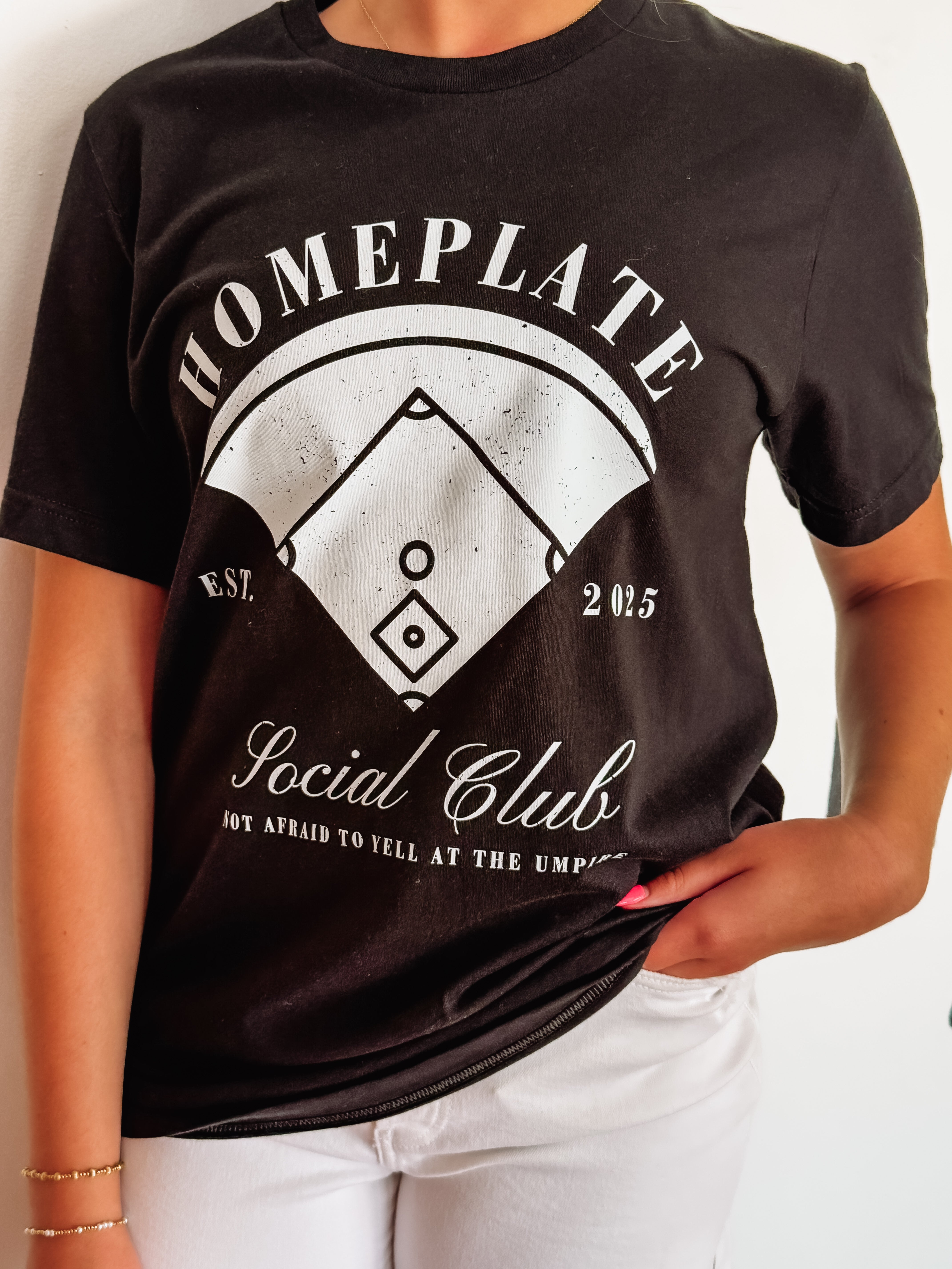 Black short sleeve tee with 'Homeplate social club - not afraid to yell at the umpire'