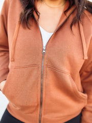 brown zip up jacket 