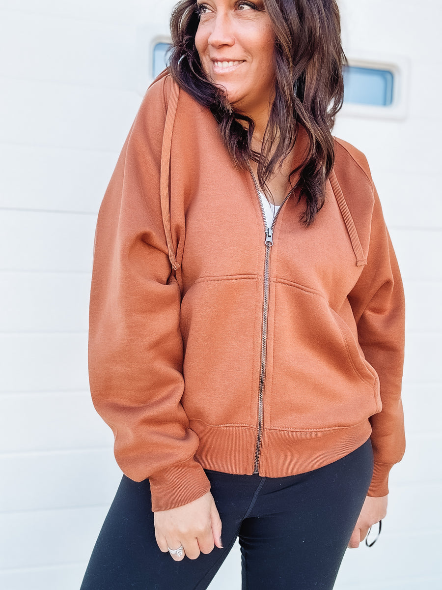 brown zip up jacket 