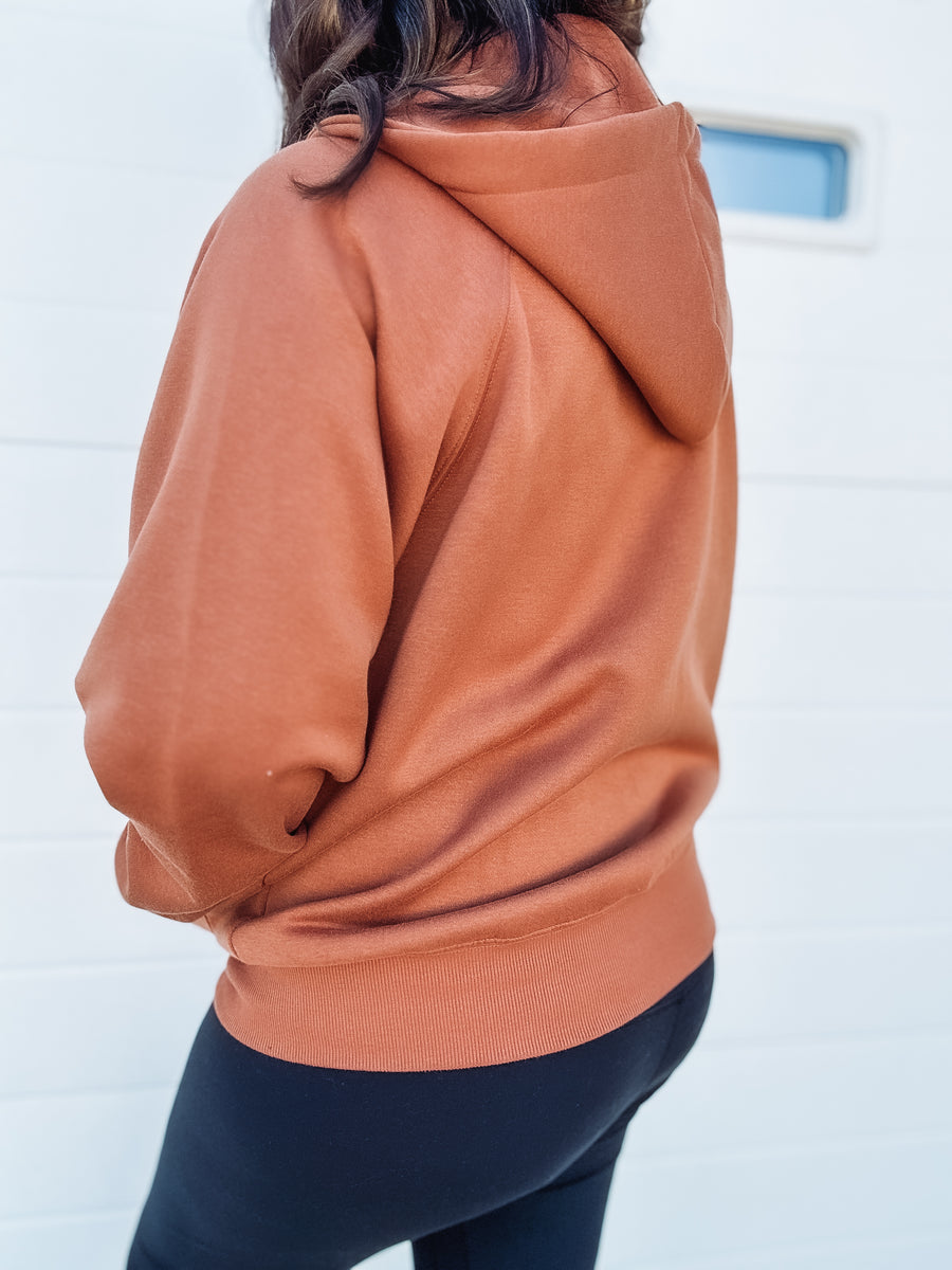 brown zip up jacket 