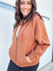 brown zip up jacket 