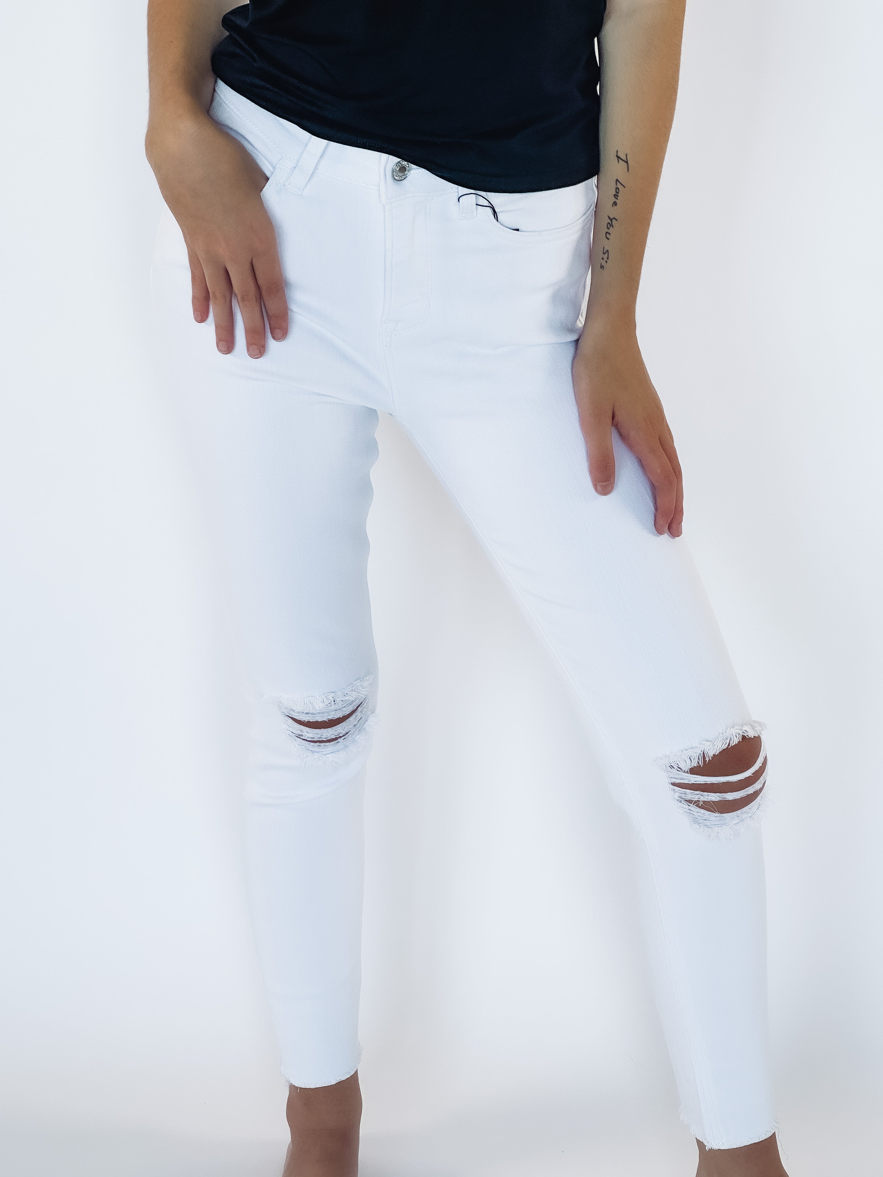 white distressed skinny jeans