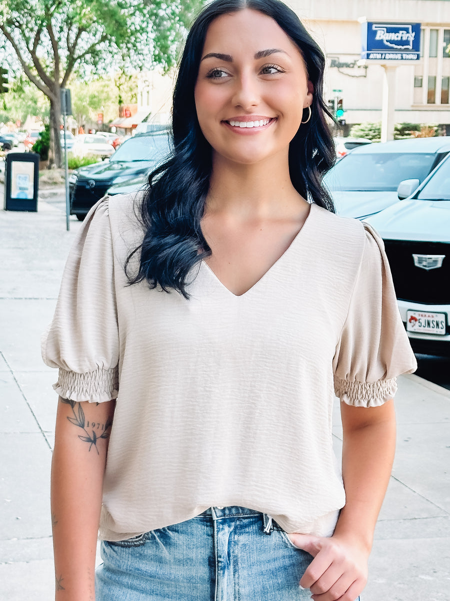 short sleeve cream colored textured blouse