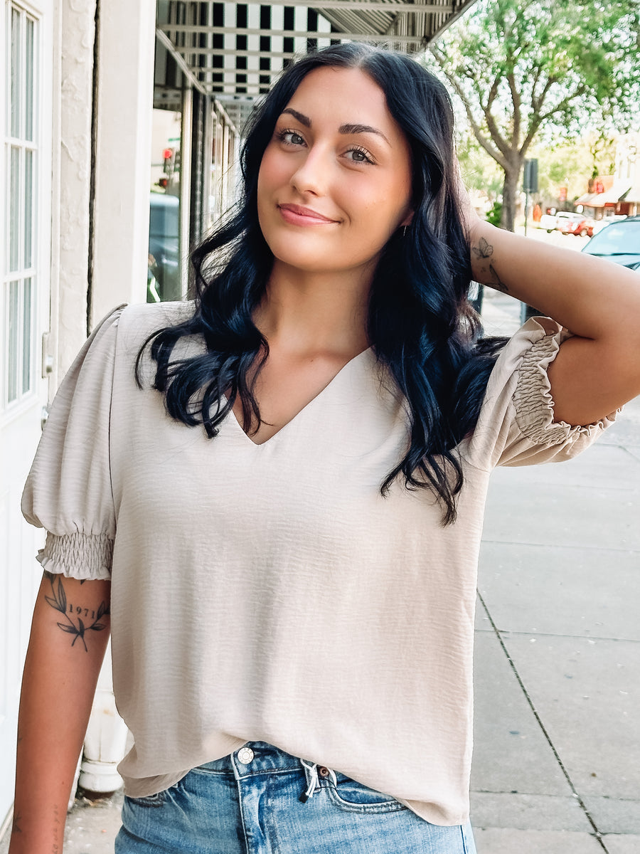 short sleeve cream colored textured blouse