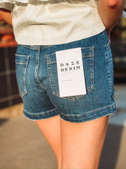 Dark wash front patch pocket shorts by Daze Denim.