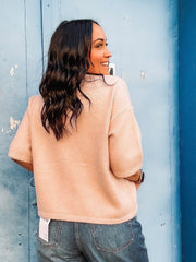 Light pink soft short Drop sleeve button up cardigan with large tortoise shell buttons.
