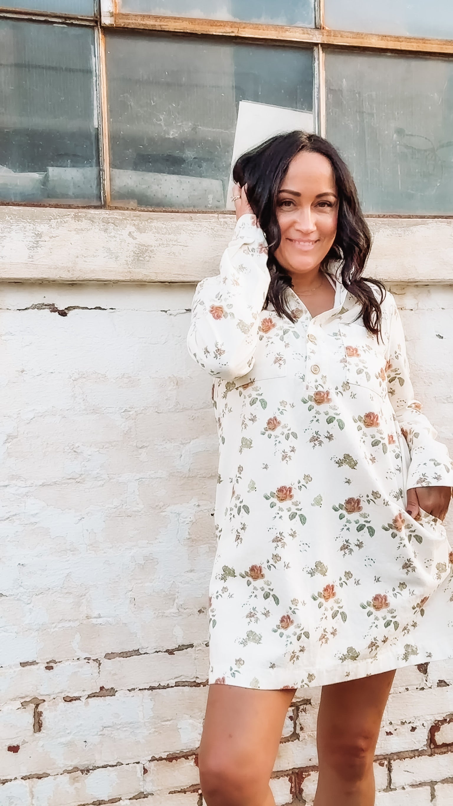 Long sleeve cream denim button up mini  dress with olive and rust florals.