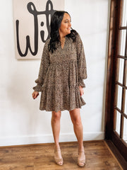 Long sleeve v neck bell sleeve leopard print tiered mini dress.