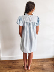 Pintuck short sleeve bubble sleeve mock neck dress.