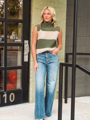 Thick olive and creamed striped knitted sleeveless turtle neck top.