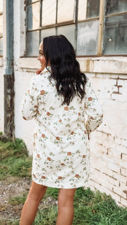 Long sleeve cream denim button up mini  dress with olive and rust florals.