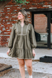 Olive tiered Hem long sleeve mini dress with cream contrast seaming.