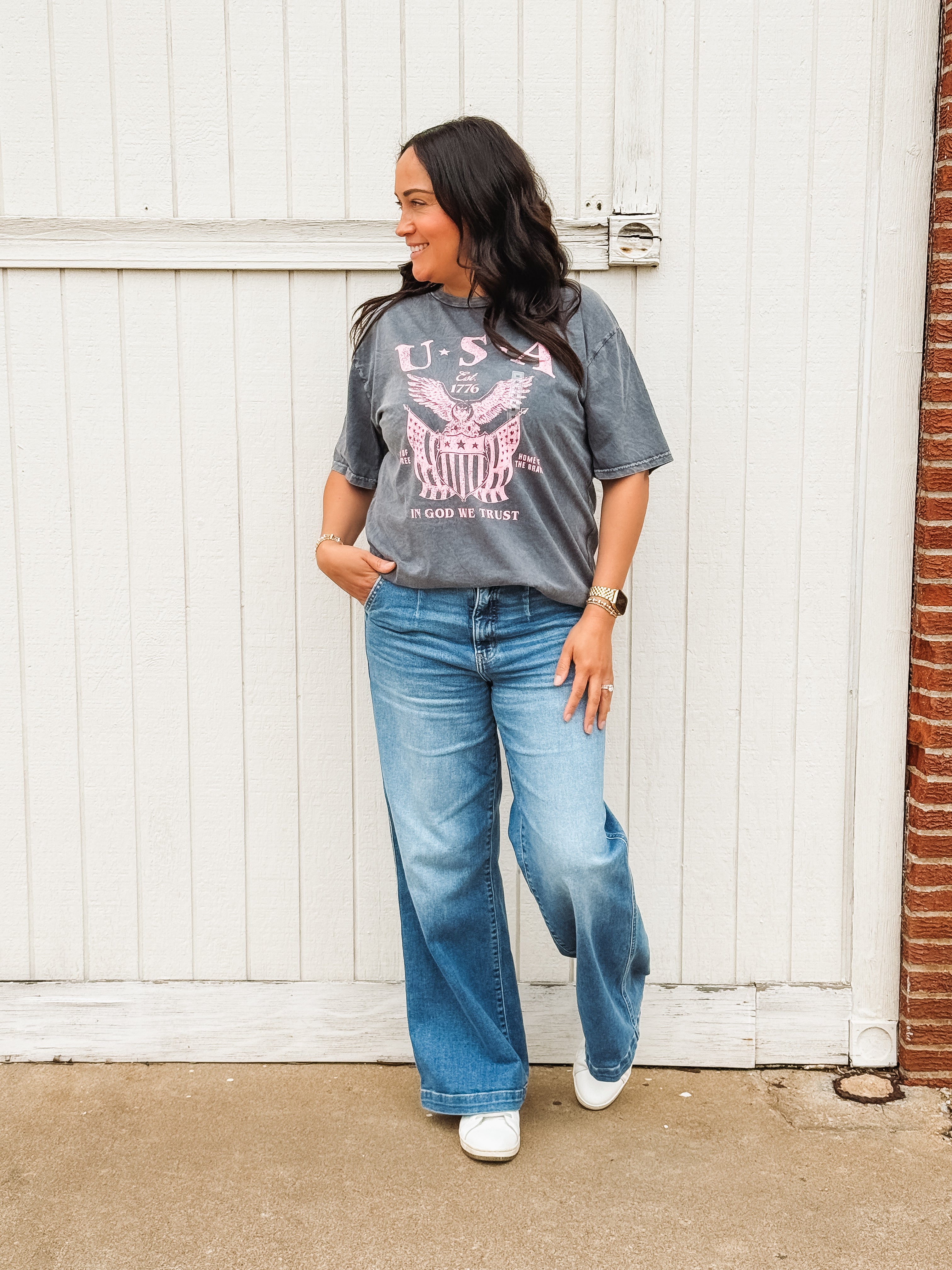 Gray graphic tee with pink 'USA' typography