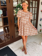 Pink and peach hued floral dress with ruffle detail