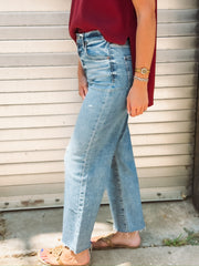 Pleaser jeans in wide awake vintage by Daze - a medium faded wash crop jean with a raw hem.