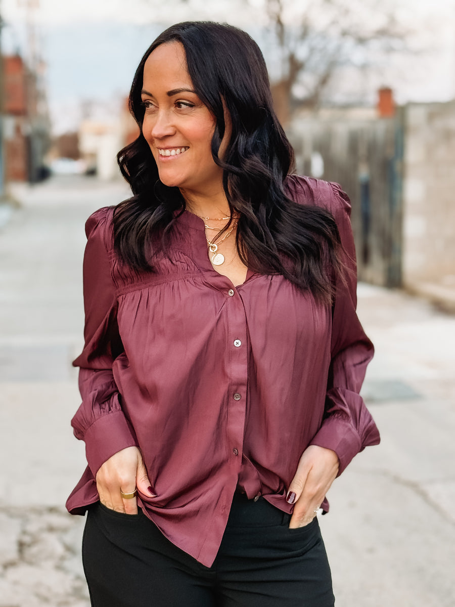 Plum pleated satin long sleeve button up  blouse with back detailing.