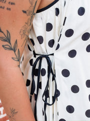 Polka dot mini dress with side tie details 