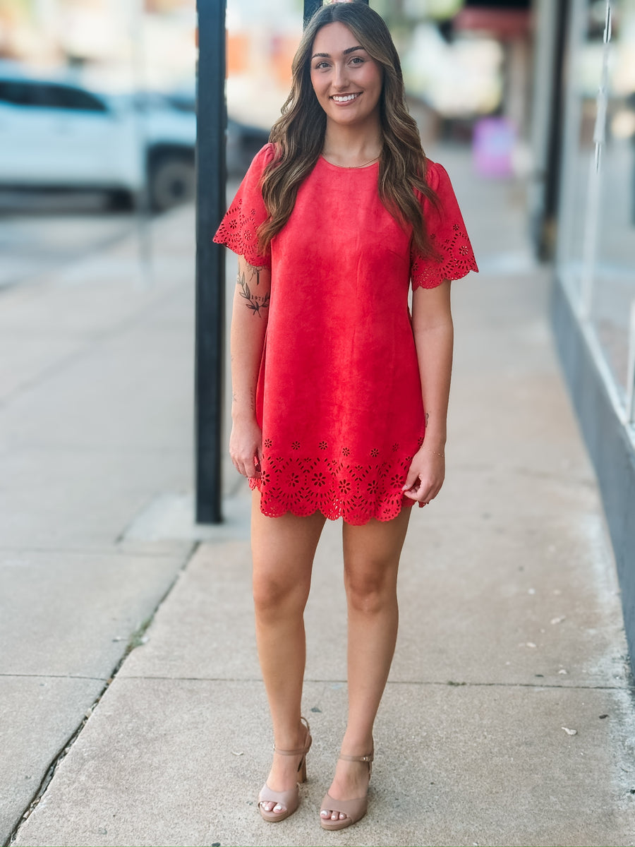 Tomato red short sleeve mini dress with eyelet detailing on the hem and sleeves. 