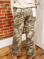 Sundaze jeans in Carpenter , a straight leg stopped cut, In Hideway, a dark camo print.