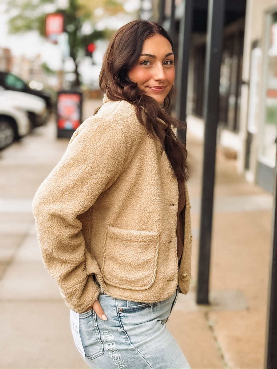 Bonded trim cropped button up sherpa jacket in a camel color.